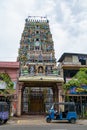 Tuk Tuk parked outside a Colorful Hindu temple
