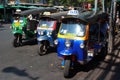 Tuk-tuk taxis wait for passengers in Bangkok, Thailand Royalty Free Stock Photo