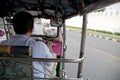 Man driving Tuk Tuk in Bangkok Royalty Free Stock Photo