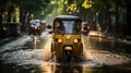 Tuk tuk driving through a flooded street during a flood caused by heavy rain