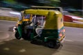 Tuk Tuk at night in New Delhi, India Royalty Free Stock Photo