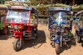 Tuk tuk parked outside the temple in Udon Thani province, Thailand. Royalty Free Stock Photo