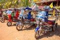 Tuk tuk parked outside the temple in Udon Thani province, Thailand. Royalty Free Stock Photo