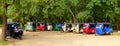 Line of parked Tuk Tuks