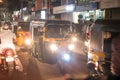 Tuktuk Indian street from window in the bus Kerala India