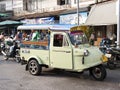 Tuktuk motor tricycle symbol of Trang province, Thailand. Royalty Free Stock Photo