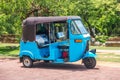 Tuktuk taxi on road of Sri Lanka Ceylon travel car