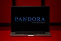 Tula 06.02.2020 Pandora internet radio logo on the laptop screen isolated on the red background. Royalty Free Stock Photo