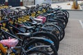 Tula, Russia - August 2, 2021: Row of many bicycle at public outdoor bicycle parking under summer daylight.