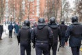 TULA, RUSSIA - JANUARY 23, 2021: Public mass meeting in support of Alexei Navalny, group of police officers going to