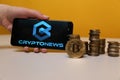 Tula, Russia - May 12 , 2019: Cryptonews on phone display. Royalty Free Stock Photo
