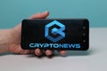 Tula, Russia - May 12 , 2019: Cryptonews on phone display. Royalty Free Stock Photo