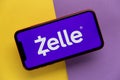 Tula, Russia - November 11, 2020: Zelle logo on iPhone display Royalty Free Stock Photo