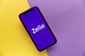 Tula, Russia - November 11, 2020: Zelle logo on iPhone display