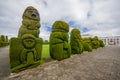 TULCAN, ECUADOR - JULY 3, 2016: some topiary figures located in the garden of the cemetery