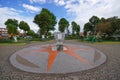 TULCAN, ECUADOR - JULY 3, 2016: sunclock located in the middle of a park with some trees as background Royalty Free Stock Photo