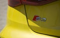 Tulce, Poland - June 2023: Yellow Audi S3 Sedan rear logo