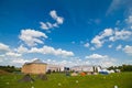 Campground with tourist tents on the square in front of right wing of Polish count Potocki palace, before Tulchyn Opera Festival