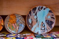 Tulchyn, Ukraine - 06.10.2020: traditional Ukrainian clay plate, modern painting style, festival and abstract ornament glaze paint