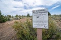 Sign warning visitors to get a screening pass before entering caves in Lava Beds National Royalty Free Stock Photo