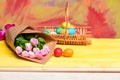 Tulip flower bouquet. Healthy and happy holiday. painted eggs in egg basket. Happy easter. Egg hunt. Spring holiday