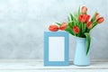 Tulip flower bouquet and photo frame Royalty Free Stock Photo