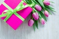 Tulip Flowers and Giftbox on rustic table for March 8, International Womens Day, Birthday , Valentines Day or Mothers day - Top V Royalty Free Stock Photo