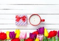 Tulips, cup and gift Royalty Free Stock Photo