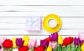 Tulips, cup and gift Royalty Free Stock Photo