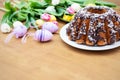 Tulips, eggs and pastry on wooden boards Royalty Free Stock Photo