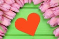 Tulips flowers with heart as symbol of love on Valentine's day Royalty Free Stock Photo