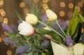 Tulips and Lavender bouquet on golden light background of vintage confetti in soft blur Pattern background texture poster postcard