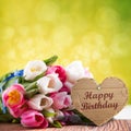 Tulips with message saying `Happy birthday` Royalty Free Stock Photo