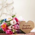 Tulips with message saying `Happy Birthday`