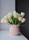 Tulips in pink vase