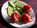 Tulips salad on an oval white salad bowl.