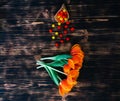 Tulips with sweets in a waffle horn on a wooden background Royalty Free Stock Photo