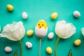 Tulips, toy chicken  and quail eggs on bright green background, top view Royalty Free Stock Photo