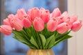 A large bouquet of delicate pink tulips