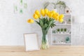 Tulips in a vase on a wooden table. Scandinavian interior. Mockup Royalty Free Stock Photo