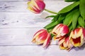 Tulips on a wooden surface. Beautiful natural background. Royalty Free Stock Photo