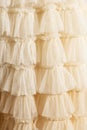 Tulle beige luxury dress with ruffles.