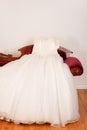 Tulle wedding dress on fainting couch