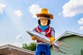 Tulsa OK Buck Atom statue with cowboy hat and rocket roadshide attraction
