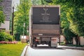 Large Party Pro Rents truck parked on leafy neighborhood street for resident planning event at their