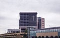Tulsa OK USA St Francis Hospital in Tulsa OKlahoma sitting up on a landscaped hill with giant cross on front windows