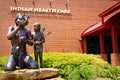 Tulsa OK USA Statues of Indian man and child planting trees outide of Indian Health Care Resource Center