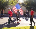 Runner with American Flag in Tulsa Run down Peoria Avenue in - close-up