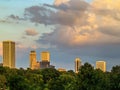 Tulsa skyline from the Northwest over trees and under and beautiful sunset sky Royalty Free Stock Photo