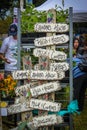 Tulsa USA Garden show with vintage Grandmas House signs for sale displayed beside flowers and plants Royalty Free Stock Photo